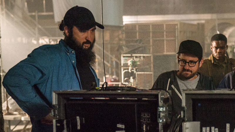 Julius Avery on the set of Overlord with his producer, J.J. Abrams.